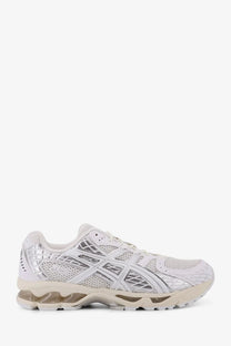 Asics men’s gel nimbus mesh sneakers in white with silver metallic accents mesh upper and cushioned midsole