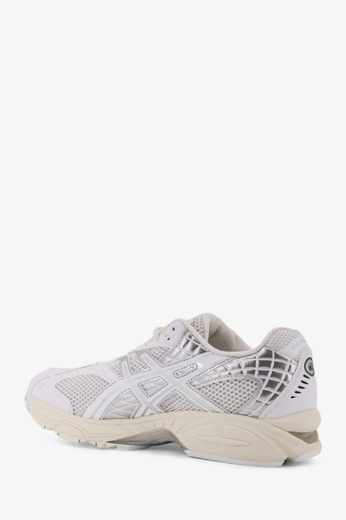 Asics men’s gel nimbus mesh sneaker in white and silver with mesh and synthetic overlays and chunky midsole