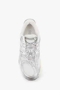 Asics men’s gel nimbus sneakers featuring silver metallic mesh and synthetic overlay with white interior lining