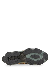 Black and olive green rubber sole with chunky tread on asics men’s gel quantum kinetic sneaker multicolor
