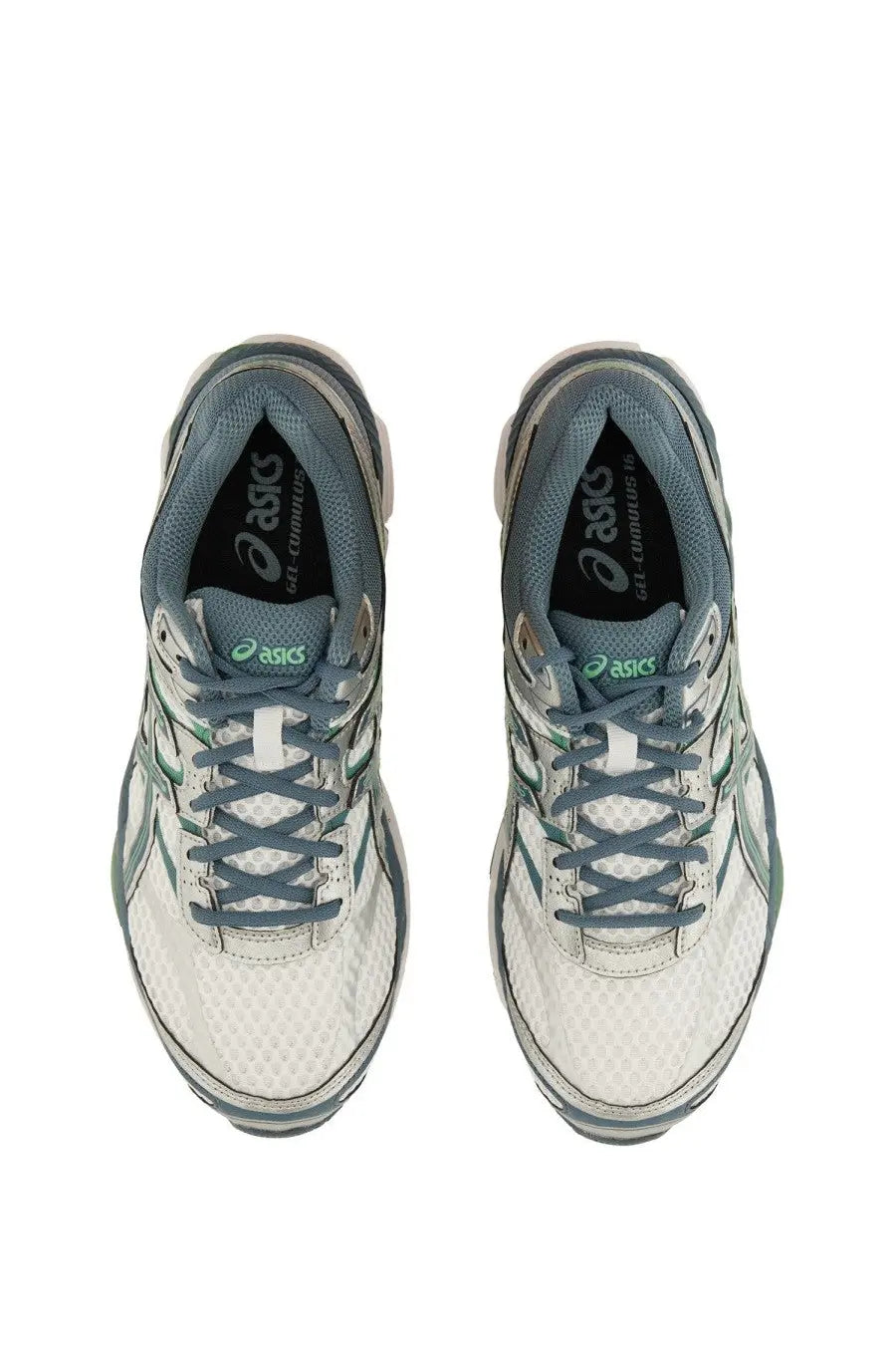 White and gray asics gel-cumulus 18 running shoes with mesh upper green accent stripes and black branding on tongue