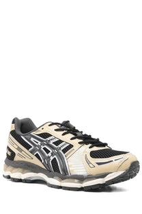 Beige and black asics gel kayano 26 unisex running shoe with mesh upper synthetic overlays and cushioned midsole