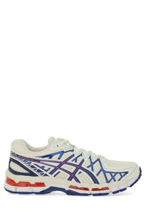 Cream-colored asics unisex gel kayano sneaker with blue and red accents breathable mesh upper and visible gel cushioning