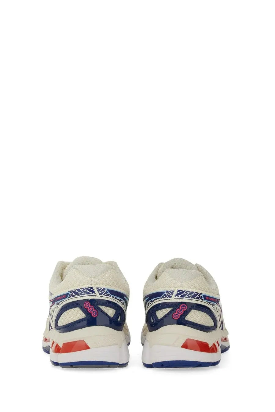 Cream-colored asics unisex gel kayano sneaker with navy blue and red mesh upper and geometric detailing