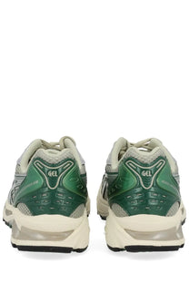 Asics unisex gel kayano sneaker in green and gray with translucent white midsole designed for running performance