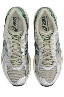Asics unisex gel kayano 18 running shoes in white and green with mesh and synthetic overlays for support
