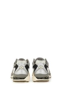 Asics unisex gel nimbus sneaker grey in silver and black with translucent gel cushioning unit for comfort and support