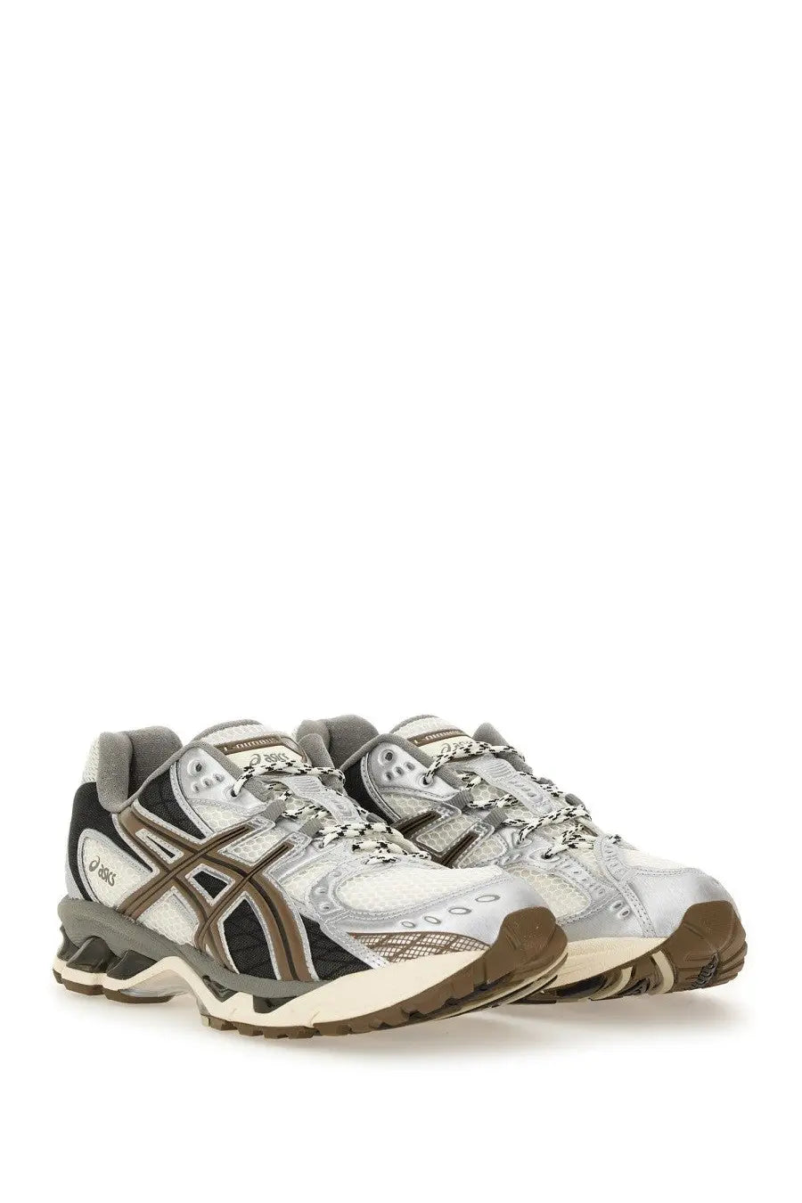 Silver and black asics gel-kayano 14 running shoes with brown accents shown with grey gel nimbus sneaker background