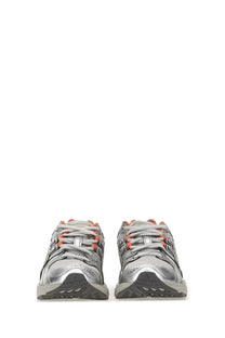 Asics unisex gel nimbus sneaker in silver and coral orange with mesh upper and rubber sole for running