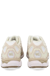 Cream-colored asics unisex gel nyc sneaker with mesh and synthetic overlays white midsole beige outsole