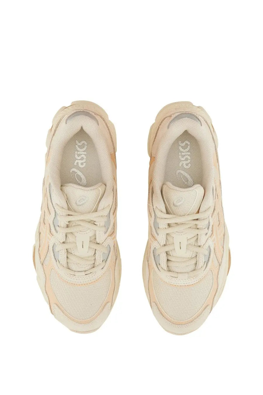 Cream-colored asics unisex gel nyc sneaker with chunky layered design and breathable mesh upper in beige