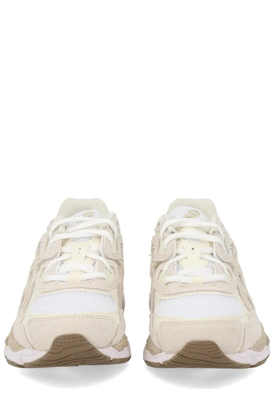 Cream-colored asics unisex gel nyc sneaker with white mesh suede accents and chunky beige tan sole
