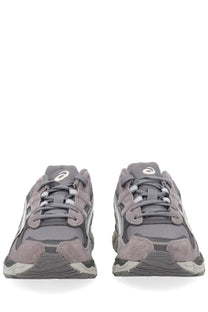Gray asics unisex gel nyc running shoes with suede and mesh upper white laces and layered rubber sole