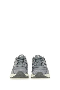 Gray asics unisex gel nyc sneaker with textured upper and white midsole for casual and athletic wear