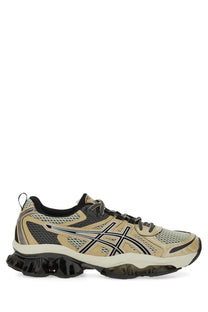 Beige and black asics gel-kayano 28 running shoe with mesh upper rubber outsole and signature logo in multicolor design