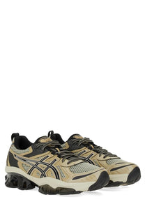 Beige and black asics unisex gel quantum kinetic sneaker with mesh upper and rubber sole for running and training