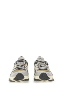 Gray and black asics unisex gel quantum kinetic sneaker with mesh upper rubber sole and chunky midsole