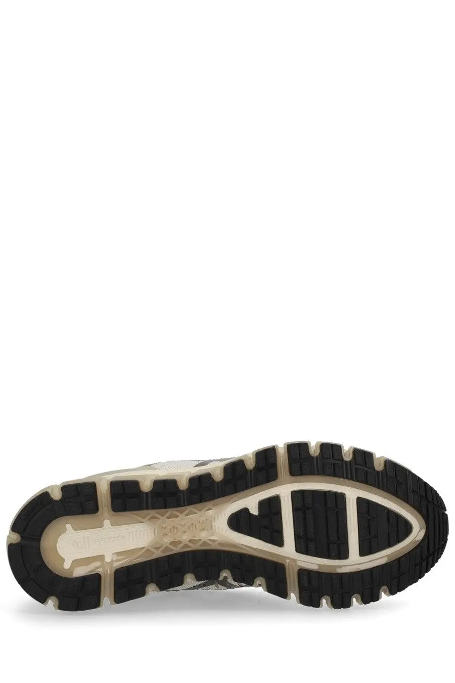 Black and beige rubber sole with textured tread and asics gel nimbus 24 printed on midsole of unisex gel quantum sneaker