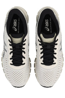 Asics unisex gel quantum sneaker in white and black with breathable mesh upper and segmented midsole for running