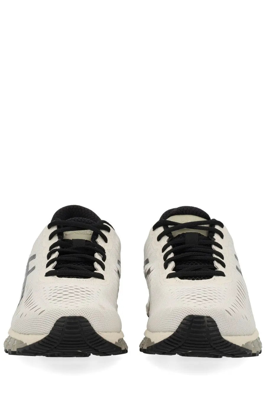 Asics unisex gel quantum sneaker in white and black with breathable mesh upper and textured rubber sole