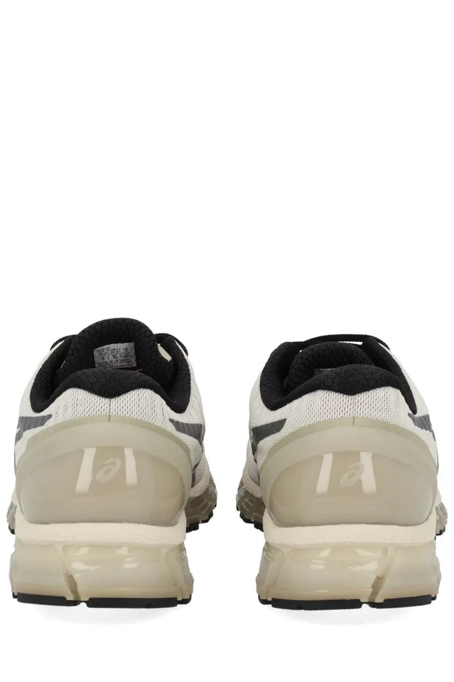 Asics unisex gel quantum sneaker in white and black with translucent beige midsole and breathable mesh upper