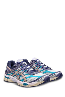 Asics unisex sneaker gel cumulus in white navy blue and teal with mesh upper and supportive midsole for running