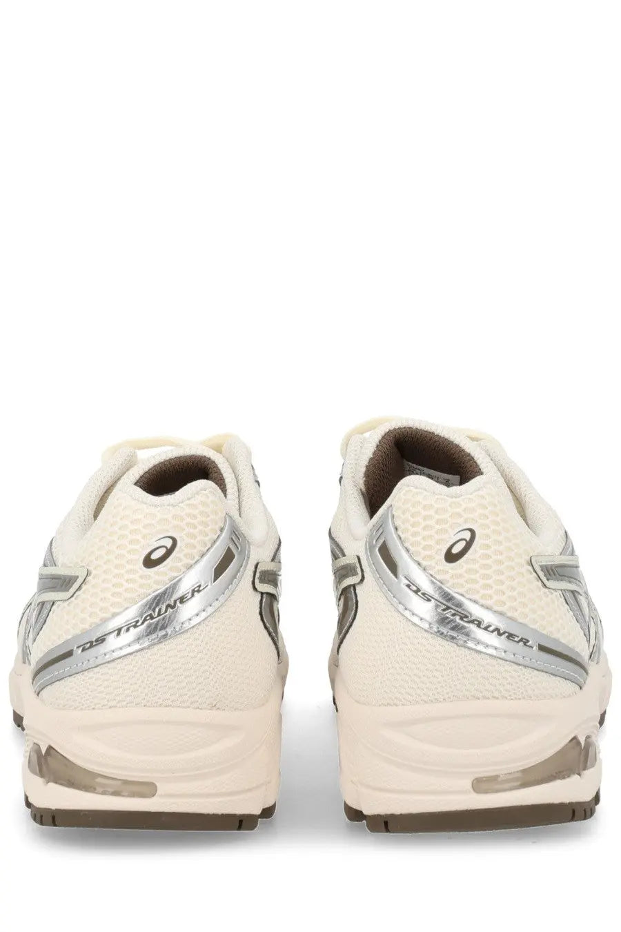 Cream-colored asics unisex sneaker gel ds trainer with silver metallic accents and a breathable mesh upper