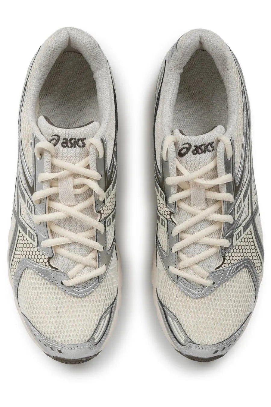 A pair of asics unisex sneaker gel ds trainer beige with sleek off-white mesh silver accents and geometric side patterns