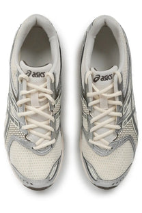 A pair of asics unisex sneaker gel ds trainer beige with sleek off-white mesh silver accents and geometric side patterns