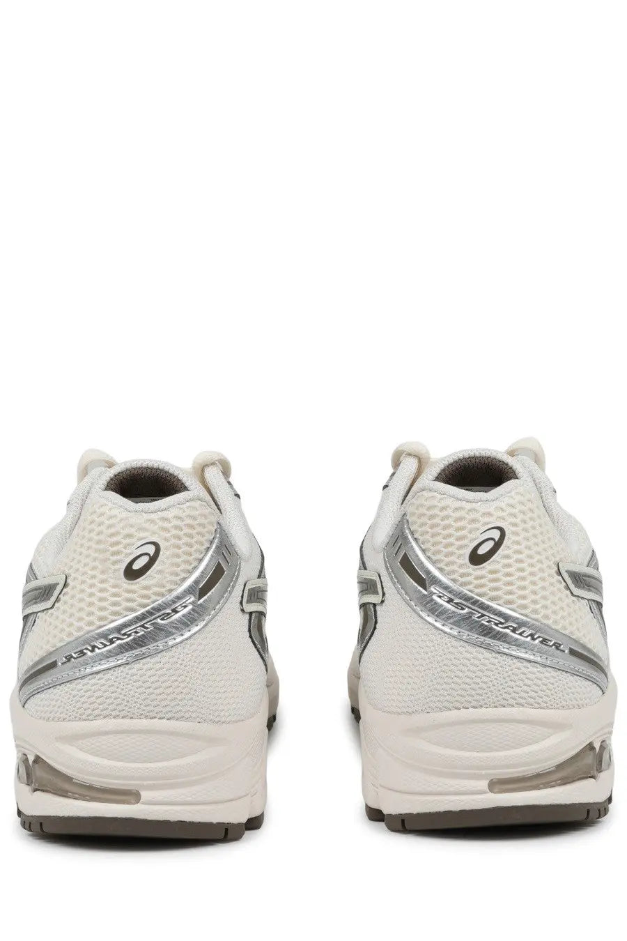 White asics gel-kayano 18 running shoes with silver accents and mesh upper in a unisex beige gel ds trainer design