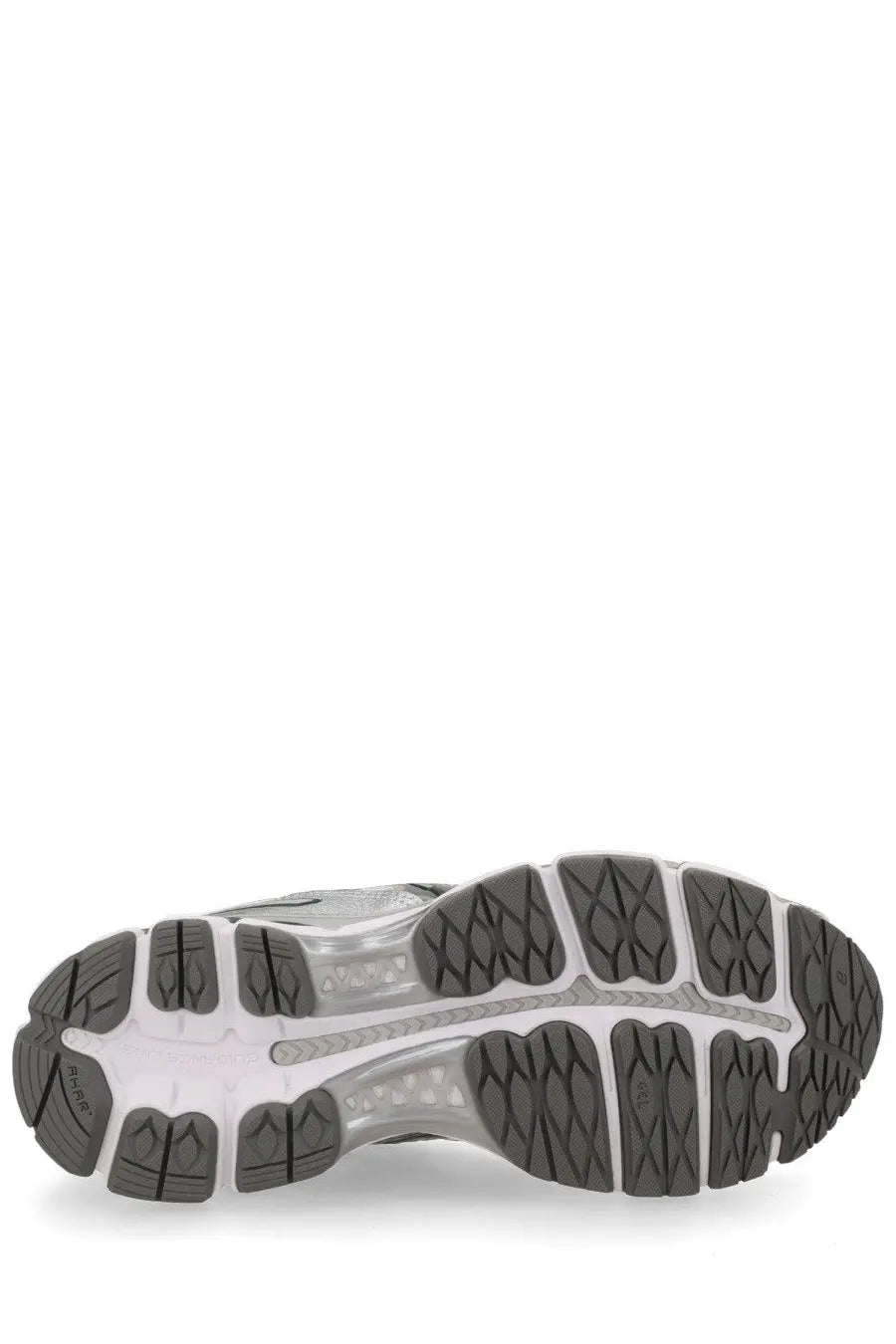 Back view of asics unisex sneaker gel kayano beige showing gray and white rubber sole with textured tread and asics logo