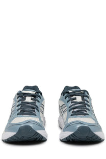 Light blue and white asics unisex sneaker gel kayano with dark gray laces and accents for running and casual wear