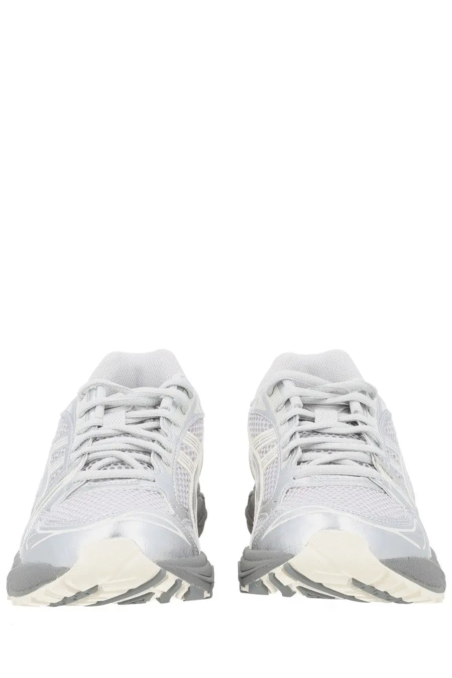 A pair of asics unisex sneaker gel kayano grey running shoes with silver gray mesh uppers white laces and rubber sole