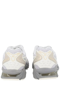 Asics unisex sneaker gel kayano grey featuring white and beige mesh with chunky gray sole and visible air cushioning units