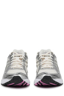 Silver and white asics unisex gel kayano sneaker with pink sole accents designed for athletic use