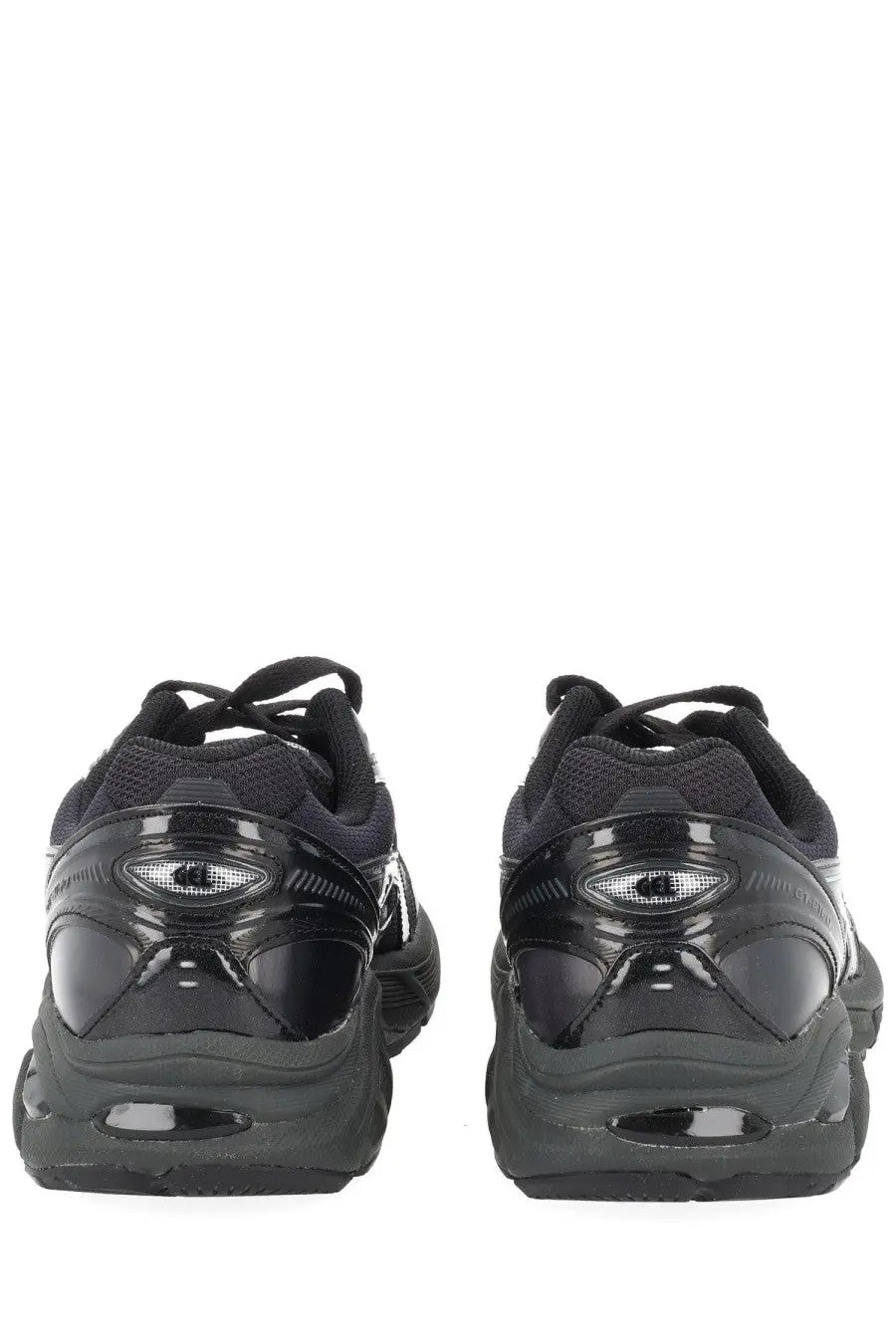 Back view of asics unisex sneaker gt black glossy black sneakers with chunky sole and reflective eye logo on heel