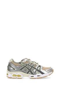 Asics women’s gel nimbus sneaker in silver and beige with mesh, synthetic overlays, and translucent yellow air unit