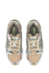 Asics women’s gel nimbus sneaker silver beige and silver running shoes with mesh uppers metallic accents and lime branding