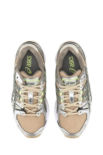 Asics women’s gel nimbus sneaker silver beige and silver running shoes with mesh uppers and lime green branding details