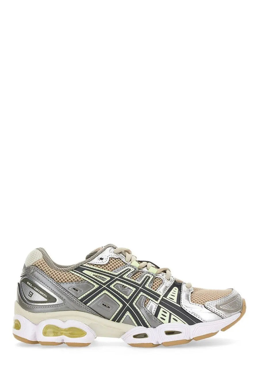 Asics women’s gel nimbus sneaker in silver with black mesh upper, beige midsole, and translucent yellow air cushioning units