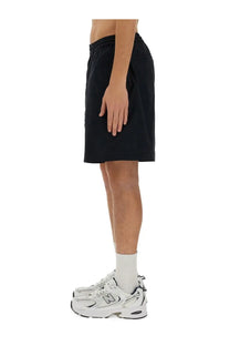 Aspesi men’s bermuda nemo blue athletic shorts in black with drawstring waistband and side pockets worn by model