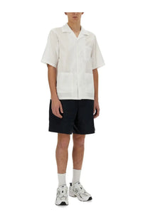 White short-sleeved button-up shirt with collar and two front pockets for men by aspesi in bermuda nemo blue