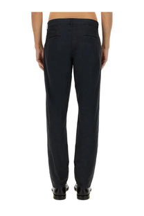 Dark navy aspesi men’s tailored chino pants with sleek straight-leg cut and subtle back pleats shown from the back