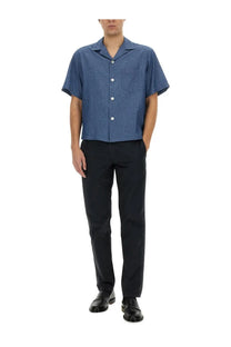 Aspesi men’s chino pants blue paired with a blue short-sleeved button-up shirt with subtle textured weave and white buttons