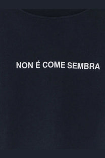 Black cotton t-shirt featuring white embroidered non é come sembra text from aspesi men’s cotton shirt blue collection