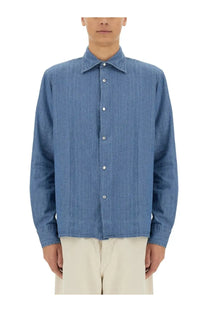 A light blue aspesi men’s denim west shirt with a classic collar and button-down front made of denim material