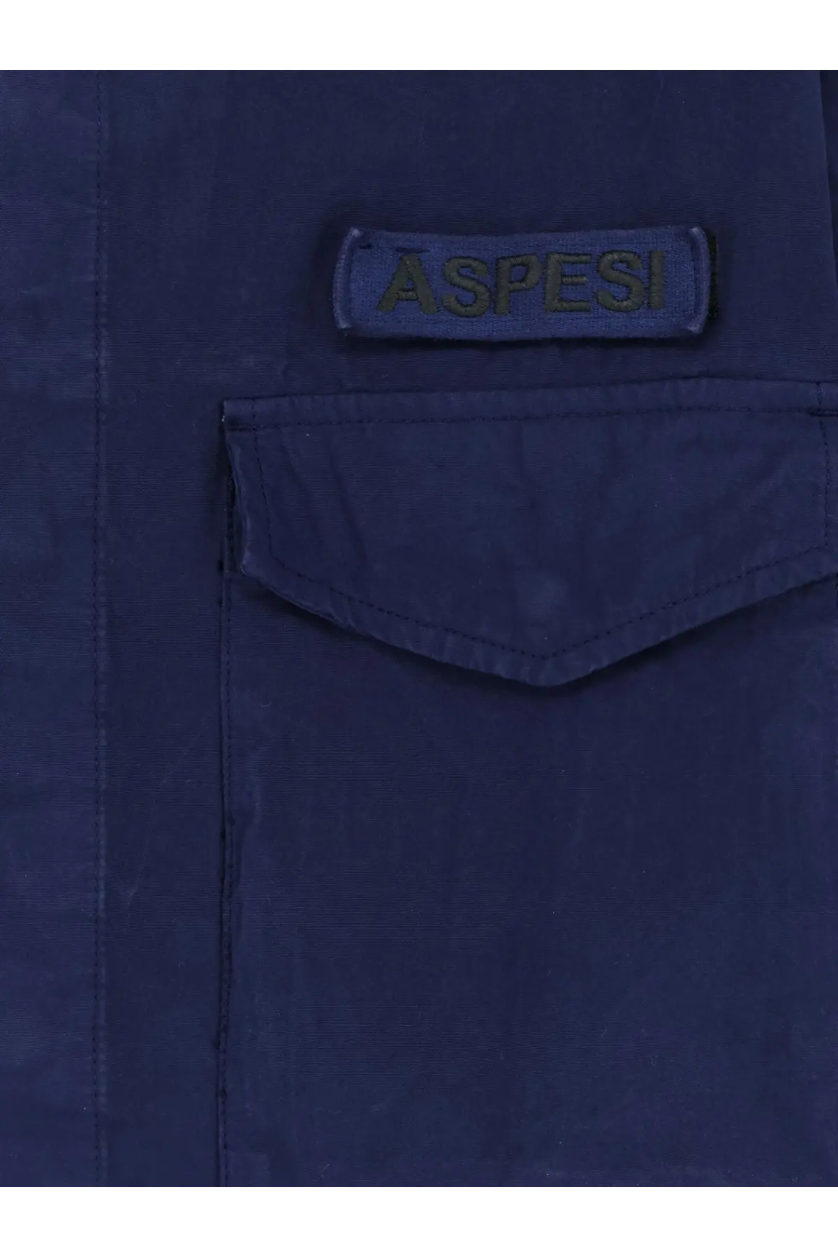 Dark blue aspesi branded patch above matching pocket on aspesi men’s field lived fabric shirt blue jacket