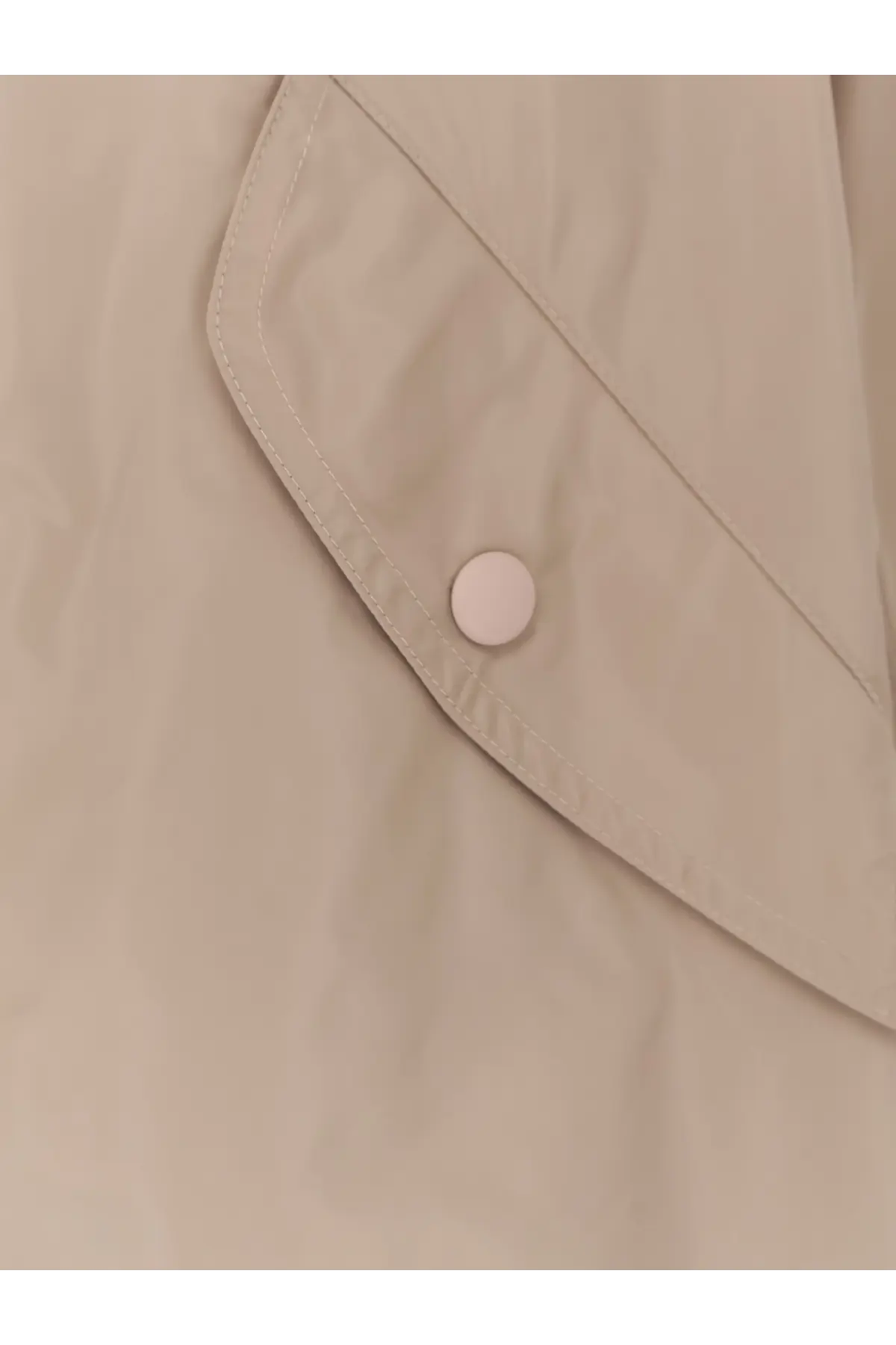 Beige aspesi women’s bombo nylon jacket with matching button on the pocket flap made from nylon fabric