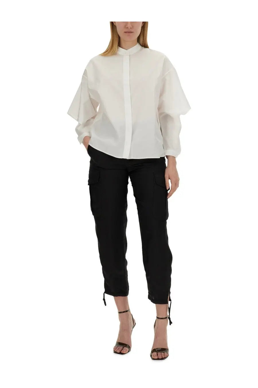 White blouse with voluminous fluttery sleeves and high collar paired with aspesi women’s black cargo pants