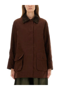 Brown waxed cotton field jacket with dark corduroy collar and flap pockets for women by aspesi